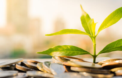 Financial Growth, Plant on pile coins with cityscape background