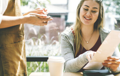 Woman ordering food at the restaurant