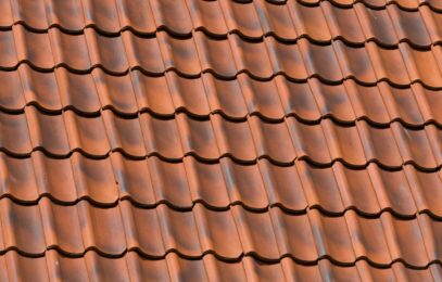 Red tiles roof background texture of a house