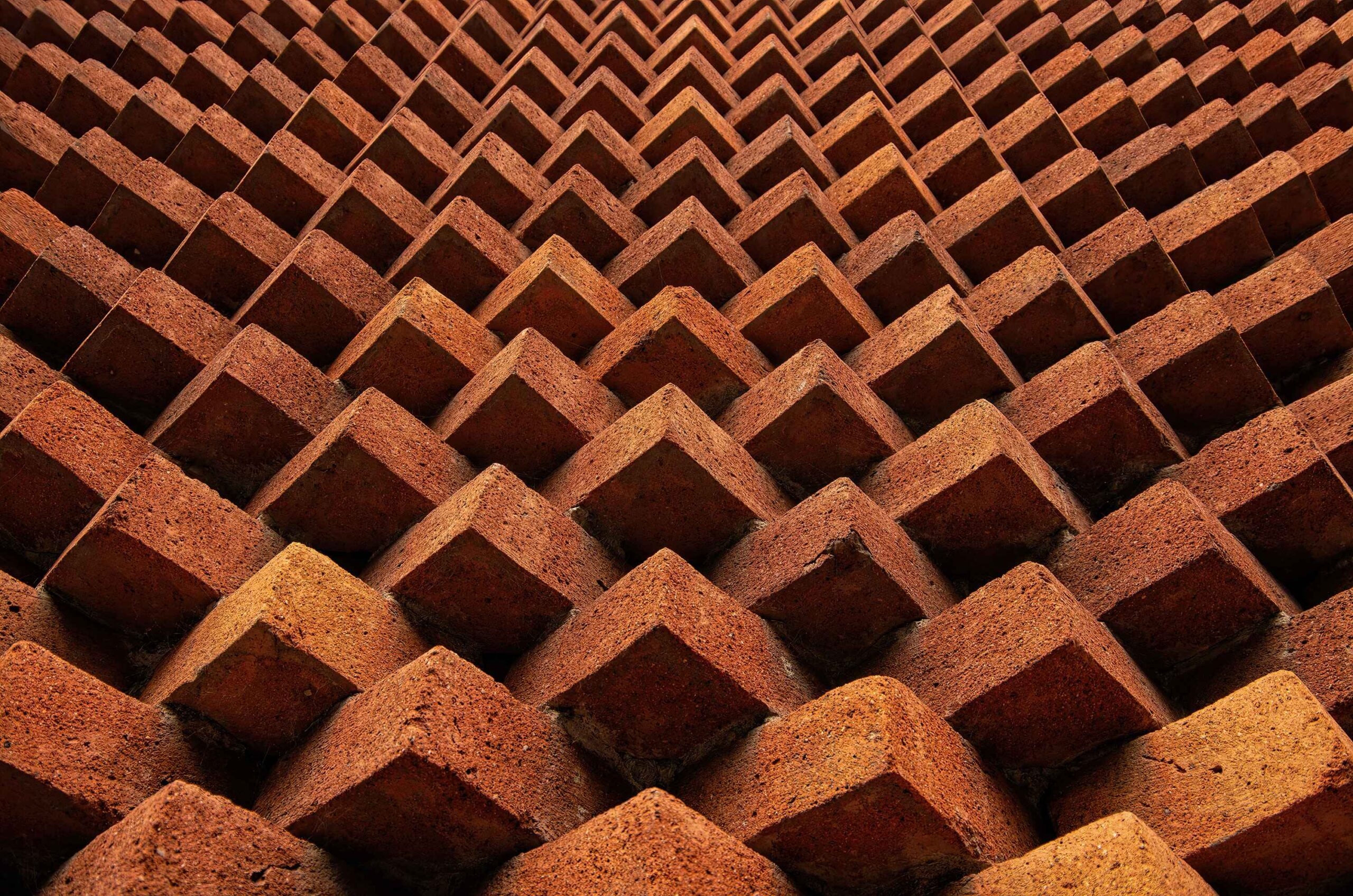 Orange brick pointy feature wall