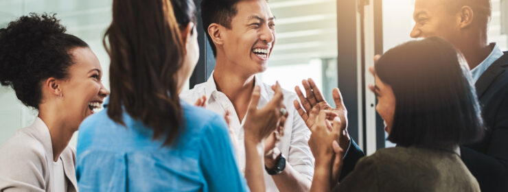 Smiling Colleagues applauding