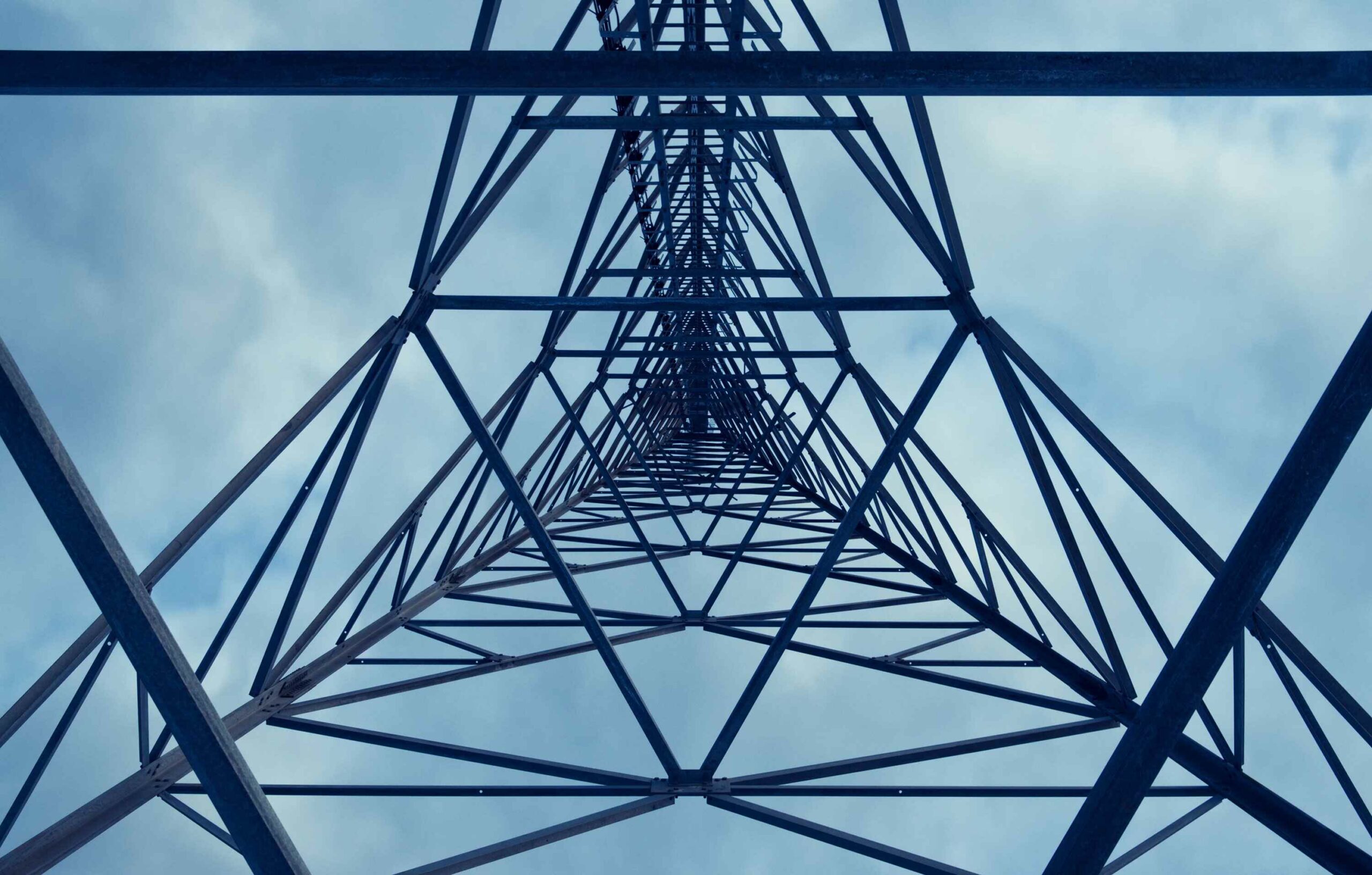 ooking directly up the middle of a communications tower.