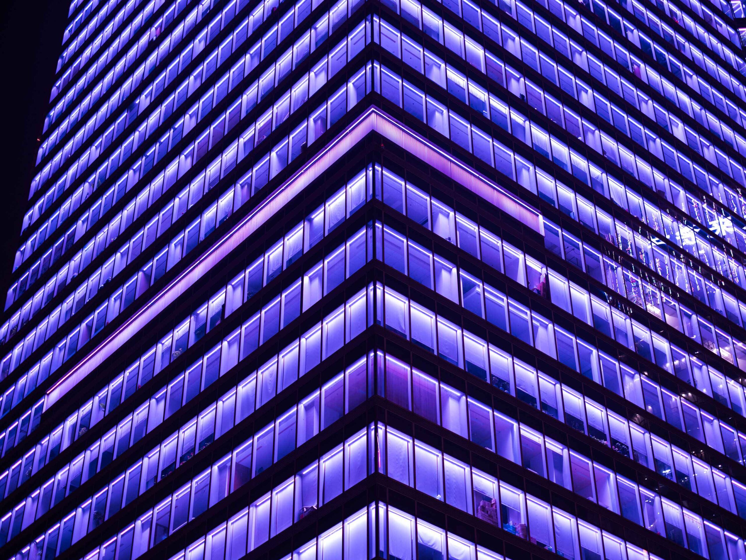 Close-up of financial building at night
