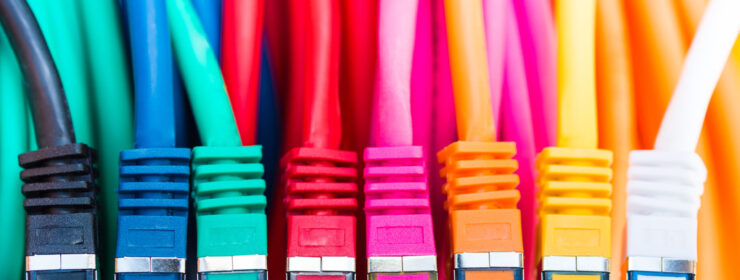 Colorful network cables connected to a switch