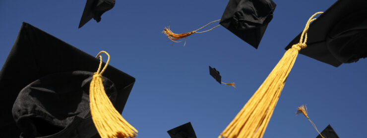 Graduation Caps Thrown in the Air