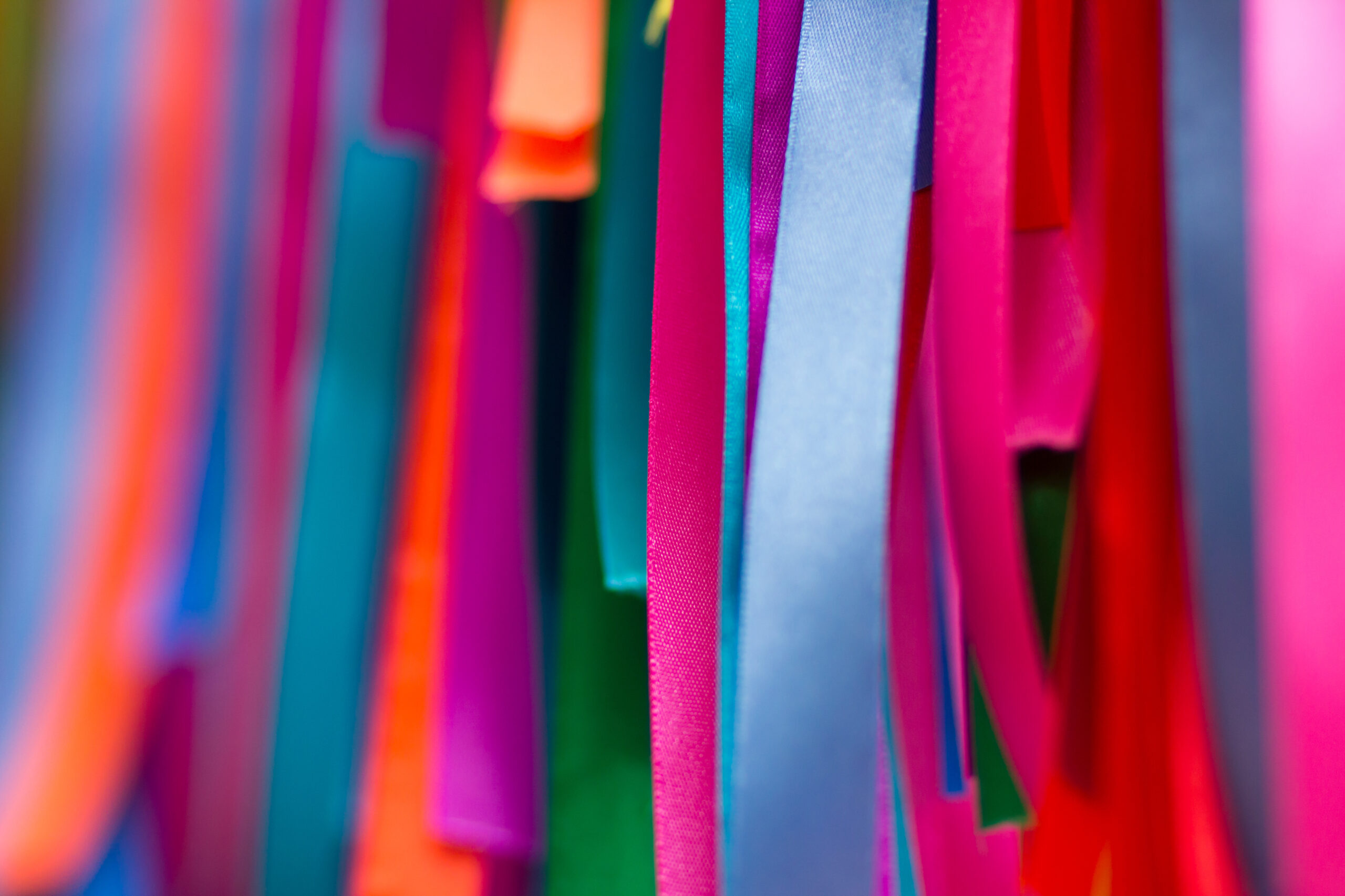 ariety of satin ribbons in different colors and lengths